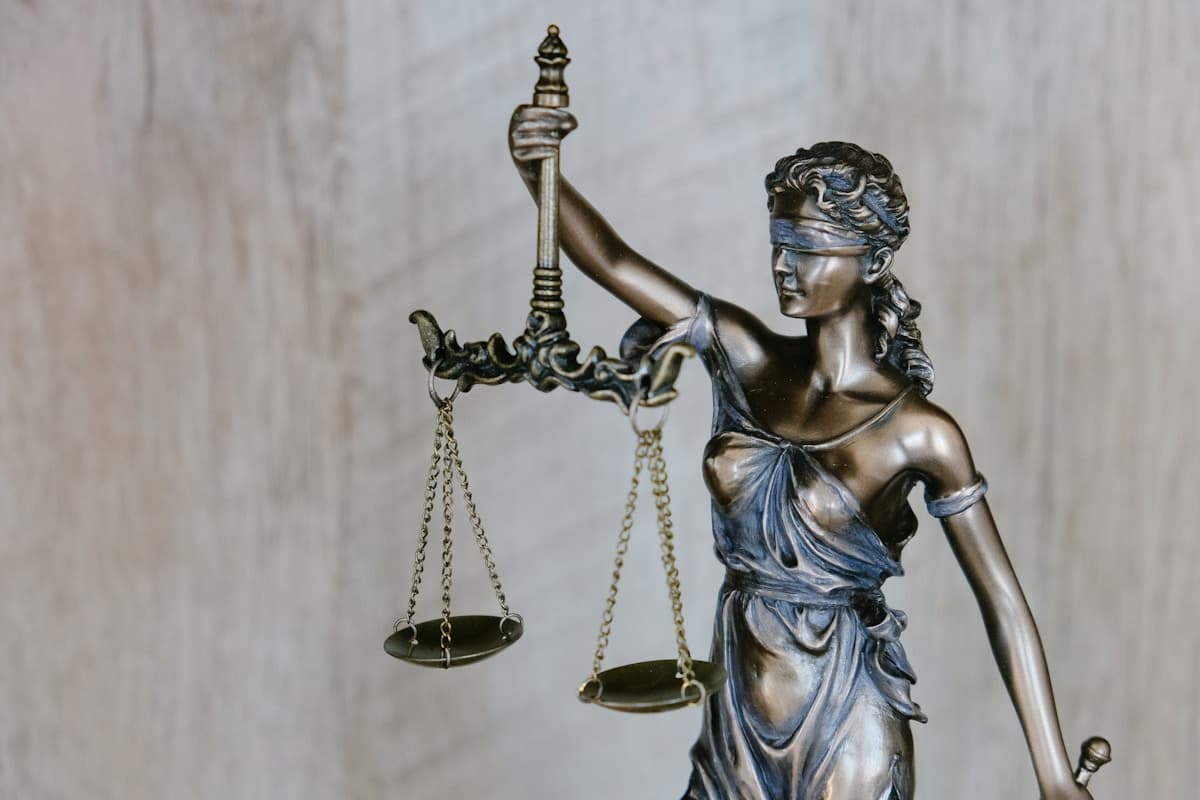 Lady Justice statue representing authority and trust in Detroit law firm websites