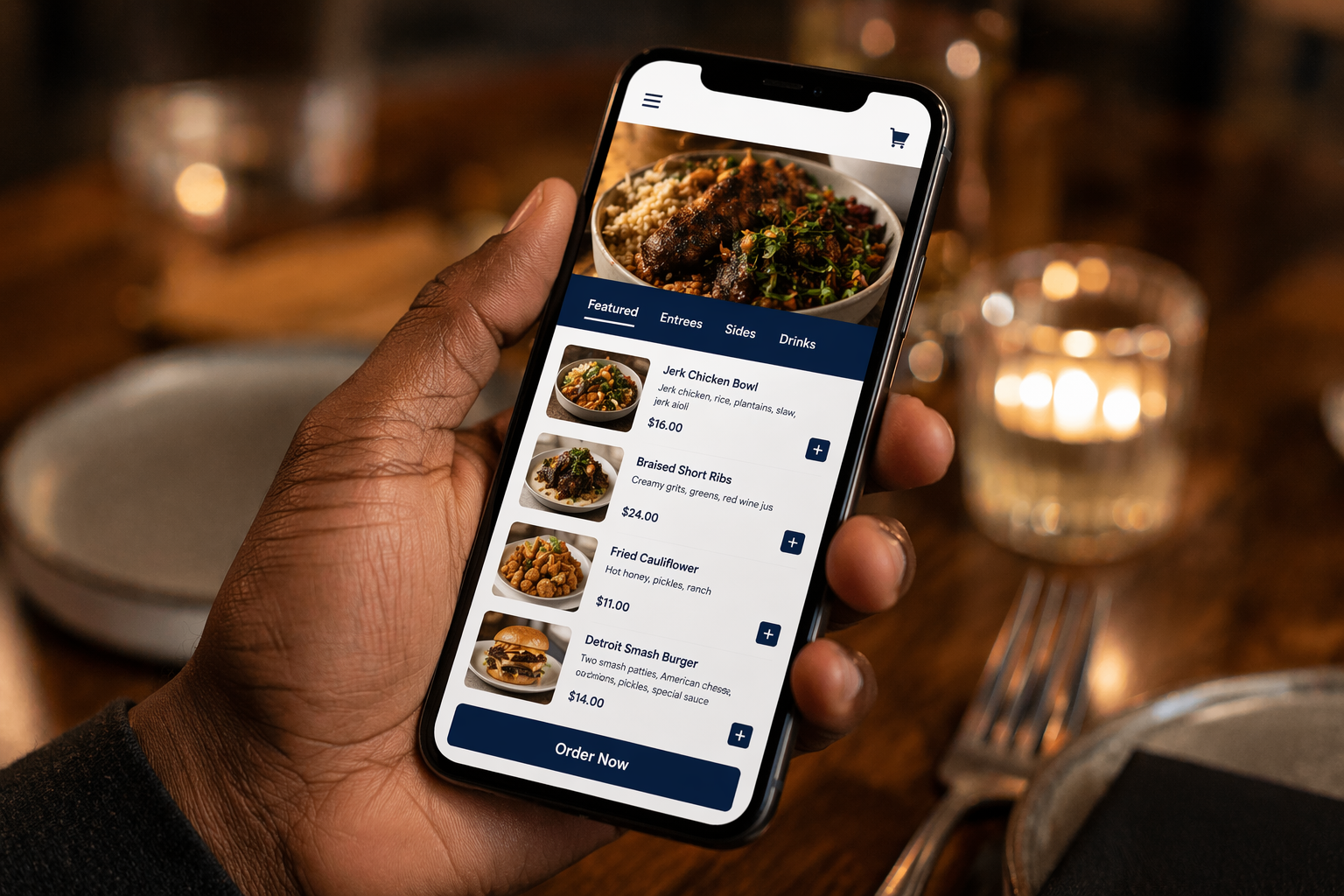 Modern hair salon website design displayed on a laptop — clean layout with large gallery images, service menu, and booking CTA