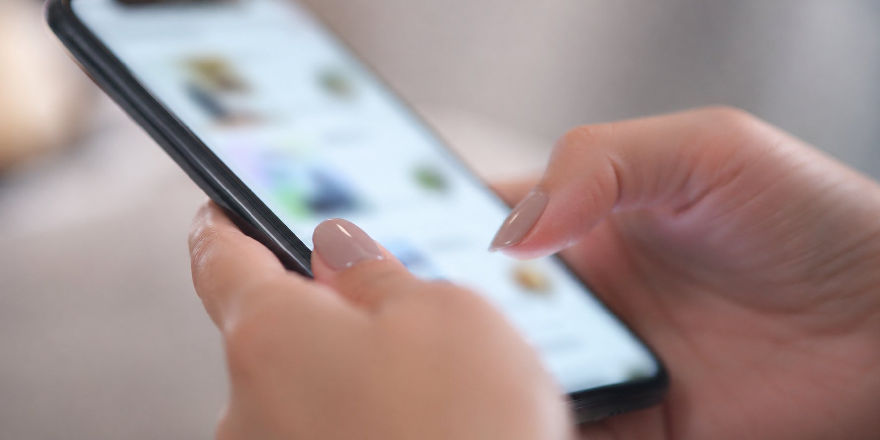 Med spa owner reviewing website analytics on laptop at desk