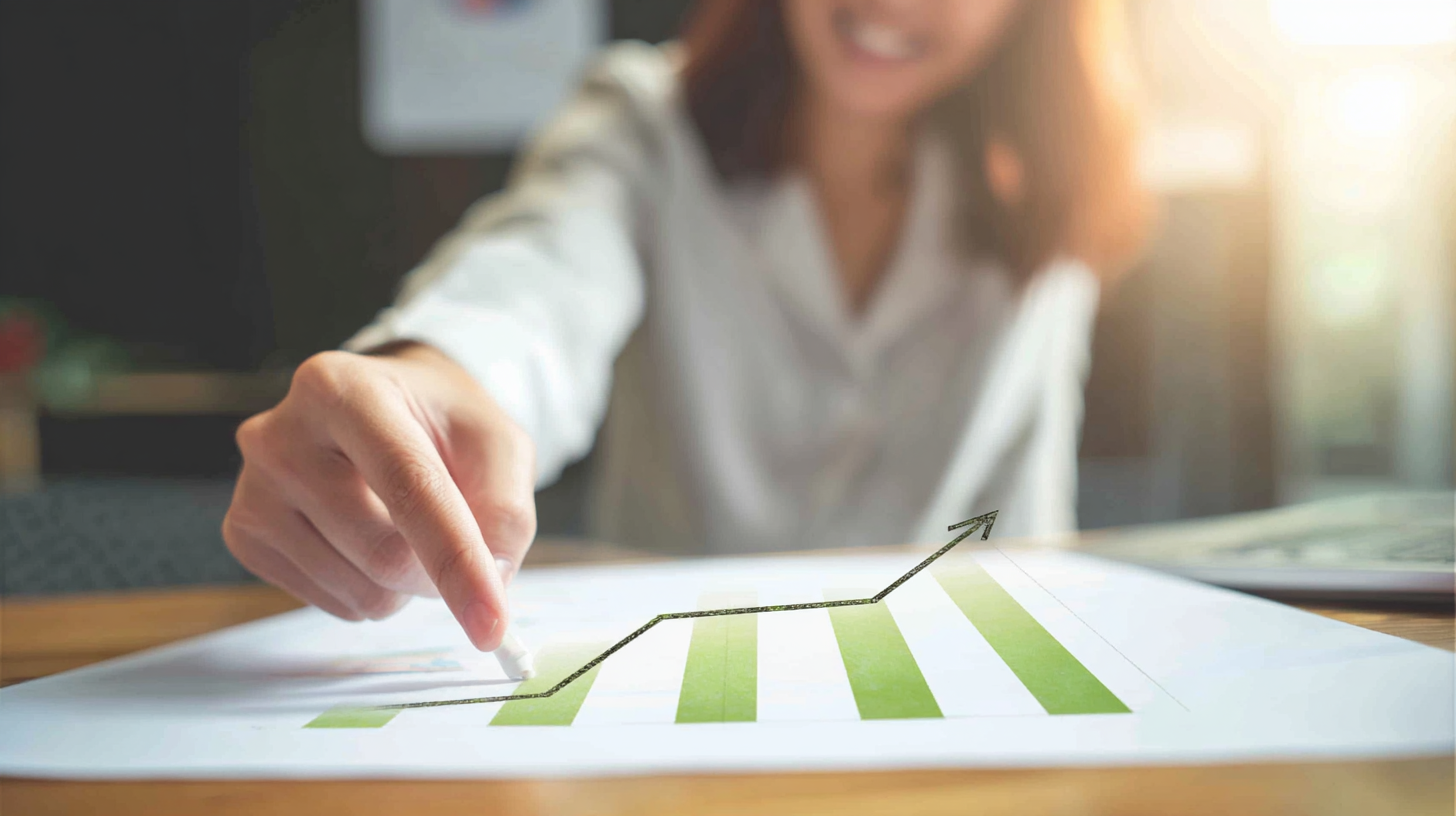 Business owner reviewing financial returns and website performance data